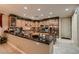 Gourmet kitchen boasting granite countertops and stainless steel appliances at 3042 Hammerwood Dr, Las Vegas, NV 89135