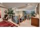 Elegant upper level landing with curved staircase and built-in desk at 3042 Hammerwood Dr, Las Vegas, NV 89135