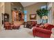 Spacious living room featuring comfortable seating and built-in shelving at 3042 Hammerwood Dr, Las Vegas, NV 89135