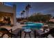 Relaxing poolside view with lounge chairs and a beautiful pool at 3042 Hammerwood Dr, Las Vegas, NV 89135