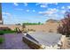 Backyard features a paver patio with hot tub overlooking the mountains at 32 Via Del Fiume, Henderson, NV 89011