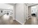 Hallway view leading to the living spaces, dining area, and a separate office at 32 Via Del Fiume, Henderson, NV 89011