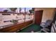 Private balcony with chair and table, offering views of the property at 350 E Desert Inn Rd # 202, Las Vegas, NV 89109
