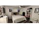 Bedroom with a queen bed, bookshelf, and dresser at 350 E Desert Inn Rd # 202, Las Vegas, NV 89109