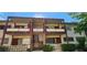 Front view of a two-story building with balconies and stairs at 350 E Desert Inn Rd # 202, Las Vegas, NV 89109