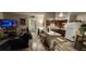 Open kitchen with wood cabinets and a breakfast bar at 350 E Desert Inn Rd # 202, Las Vegas, NV 89109