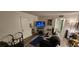 Living room with sofa, TV, and access to other rooms at 350 E Desert Inn Rd # 202, Las Vegas, NV 89109