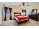 Bedroom with a double bed and dark brown dresser at 3929 Prescott Pines St # 103, Las Vegas, NV 89108