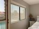 Bedroom with a view and private balcony access at 3996 Tirana Way, Las Vegas, NV 89103