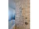 Sleek bathroom with a modern shower and glass shelving at 4381 W Flamingo Rd # 2116, Las Vegas, NV 89103