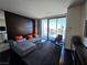 Spacious living room with comfortable seating and floor to ceiling windows at 4381 W Flamingo Rd # 2116, Las Vegas, NV 89103