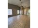 Spacious living room with tile floors and high ceiling at 4438 Galore Ave, Las Vegas, NV 89115