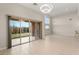 Living area with sliding doors to backyard at 6056 Willow Rock St, Las Vegas, NV 89135