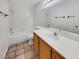 Clean bathroom with tiled shower, bathtub, and vanity at 6108 Autumn Rose Way, Las Vegas, NV 89142