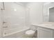 Clean bathroom with white bathtub, toilet, and vanity at 675 Omaggio Pl, Henderson, NV 89011