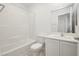 Bathroom features a shower/tub combo and white vanity at 675 Omaggio Pl, Henderson, NV 89011