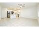 Modern kitchen with stainless steel appliances and white cabinetry at 675 Omaggio Pl, Henderson, NV 89011