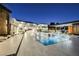 Stunning pool and spa with outdoor kitchen and lounge area at 7815 W La Madre Way, Las Vegas, NV 89149