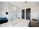 Bathroom with glass shower, modern vanity, and a view into another room at 7815 W La Madre Way, Las Vegas, NV 89149