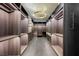 Large walk-in closet with ample shelving and LED lighting at 7815 W La Madre Way, Las Vegas, NV 89149