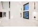 Bright two story entry with modern light fixture at 7815 W La Madre Way, Las Vegas, NV 89149