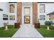 Modern entry with glass door, marble floors, and statement art at 7815 W La Madre Way, Las Vegas, NV 89149