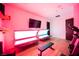 Home gym with tanning beds, treadmill, and weight bench at 7815 W La Madre Way, Las Vegas, NV 89149