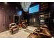 Sophisticated game room featuring a wine cellar and comfortable seating at 7815 W La Madre Way, Las Vegas, NV 89149