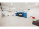 Spacious garage with extensive overhead storage and epoxy flooring at 7815 W La Madre Way, Las Vegas, NV 89149