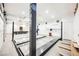 Clean and organized garage with a car lift at 7815 W La Madre Way, Las Vegas, NV 89149