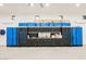 Garage with custom cabinetry, ample storage and work bench at 7815 W La Madre Way, Las Vegas, NV 89149