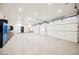 Bright and spacious 3-car garage with epoxy flooring at 7815 W La Madre Way, Las Vegas, NV 89149