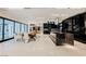 Modern kitchen with high-end appliances and large island at 7815 W La Madre Way, Las Vegas, NV 89149
