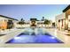 Luxury pool with fountains and outdoor seating at 7815 W La Madre Way, Las Vegas, NV 89149