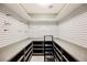Well-organized storage room with slatwall and ample shelving at 7815 W La Madre Way, Las Vegas, NV 89149