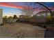 Spacious backyard with paver patio, mature landscaping, and privacy walls at 9236 Arbor Glen St, Las Vegas, NV 89123