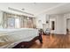 Bedroom with curtains covering a sliding glass door and a walk-in closet at 9236 Arbor Glen St, Las Vegas, NV 89123