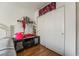 Bedroom with a closet, shelf, and dark furniture at 9236 Arbor Glen St, Las Vegas, NV 89123