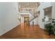 Grand two-story entrance with hardwood floors and staircase at 9236 Arbor Glen St, Las Vegas, NV 89123