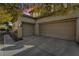 Two-car garage with spacious driveway and plenty of parking at 9236 Arbor Glen St, Las Vegas, NV 89123
