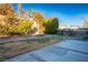 Landscaped backyard with a patio area at 10332 Splendor Ridge Ave, Las Vegas, NV 89135