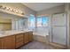 Primary bathroom with double sinks and shower at 10332 Splendor Ridge Ave, Las Vegas, NV 89135