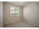 Simple bedroom with carpeted floor and window coverings at 10332 Splendor Ridge Ave, Las Vegas, NV 89135