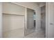 Large walk-in closet with mirrored doors at 10332 Splendor Ridge Ave, Las Vegas, NV 89135