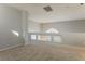 Spacious loft area with neutral carpeting at 10332 Splendor Ridge Ave, Las Vegas, NV 89135