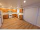 Kitchen with light oak cabinets and white appliances at 11998 Camden Brook St, Las Vegas, NV 89183