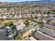 Aerial view showing house with pool and surrounding community at 165 Arrow Point Ln, Henderson, NV 89011