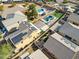 Aerial view of house with solar panels and a large backyard in a neighborhood at 165 Arrow Point Ln, Henderson, NV 89011