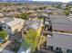 Two-story house with solar panels, pool, and desert landscape at 165 Arrow Point Ln, Henderson, NV 89011