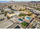 Aerial view showing home's backyard oasis, pool, and surrounding neighborhood at 165 Arrow Point Ln, Henderson, NV 89011